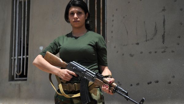 A female volunteer from Hezi-Agri (Power of Fire) detachment which fights against ISIS A female volunteer from Hezi-Agri (Power of Fire) detachment which fights against ISIS - Sputnik International