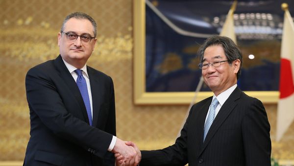 Chikahito Harada (R), the Japanese government representative and ambassador in charge of Japan-Russia relations, shakes hands with Russian Deputy Foreign Minister Igor Morgulov (L) prior to their talks at the Iikura guest house in Tokyo on June 22, 2016. Chikahito Harada (R), the Japanese government representative and ambassador in charge of Japan-Russia relations, shakes hands with Russian Deputy Foreign Minister Igor Morgulov (L) prior to their talks at the Iikura guest house in Tokyo on June 22, 2016. - Sputnik International
