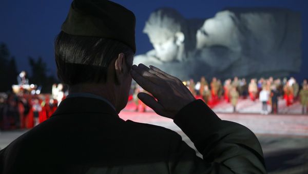 A veteran of Soviet Army salutes during a ceremony to mark the Day of Remembrance and Sorrow, on the 75th anniversary of Germany's attack on the Soviet Union in World War II in the Brest Fortress memorial, 360 kilometers (225 miles) southwest of Minsk, Belarus - Sputnik International