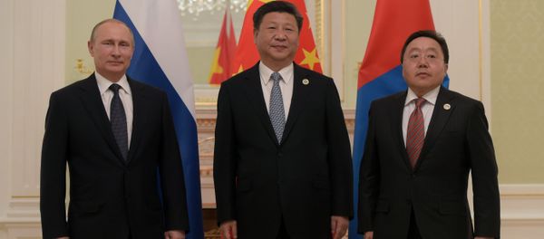 Presidents Vladimir Putin of Russia, Xi Jinping of China and Tsakhiagiin Elbegdorj of Mongolia meeting in Tashkent Presidents Vladimir Putin of Russia, Xi Jinping of China and Tsakhiagiin Elbegdorj of Mongolia meeting in Tashkent - Sputnik International