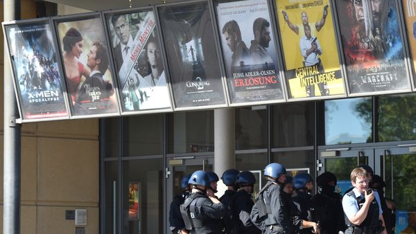 Police officers stand in front of a cinema in Viernheim near Mannheim, southern Germany Police officers stand in front of a cinema in Viernheim near Mannheim, southern Germany - Sputnik International