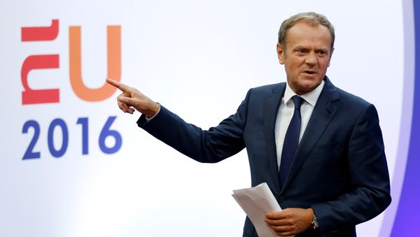 European Council President Donald Tusk gestures as he briefs the media after Britain voted to leave the bloc, in Brussels, Belgium, June 24, 2016. European Council President Donald Tusk gestures as he briefs the media after Britain voted to leave the bloc, in Brussels, Belgium, June 24, 2016. - Sputnik International