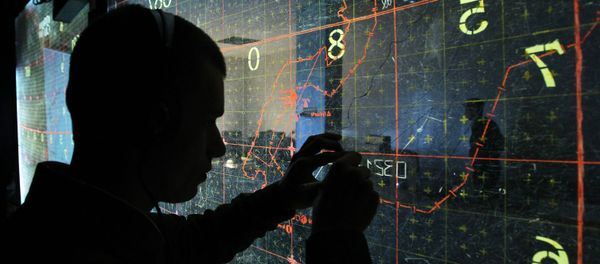 An operator by the map-board at the training command center during large-scale exercises of the Air Force and Air Defense troops - Sputnik International