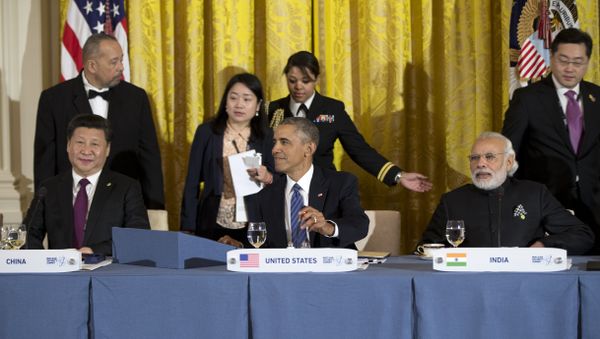 Seated from left, Chinese President Xi Jinping, President Barack Obama, and India's Prime Minister Narendra Modi, gather for a working dinner with heads of delegations of the Nuclear Security Summit in the East Room of the White House, in Washington. (File) Seated from left, Chinese President Xi Jinping, President Barack Obama, and India's Prime Minister Narendra Modi, gather for a working dinner with heads of delegations of the Nuclear Security Summit in the East Room of the White House, in Washington. (File) - Sputnik International