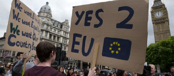 A demonstrator holds a placard during a protest against the outcome of the UK's June 23 referendum on the European Union (EU), in central London on June 25, 2016 - Sputnik International