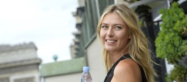 Russina tennis player and international ambassador for French mineral water company Evian, Maria Sharapova poses during a photocall prior to the start of the sporting season for the Evian brand (Tennis and Golf) in Paris on May 18, 2015 - Sputnik International