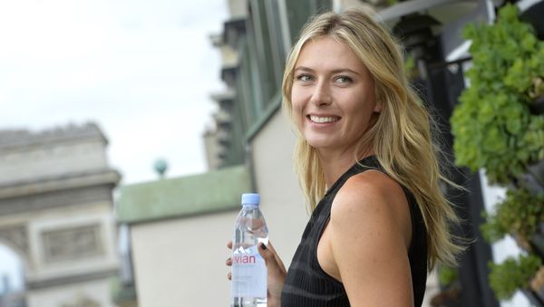 Russina tennis player and international ambassador for French mineral water company Evian, Maria Sharapova poses during a photocall prior to the start of the sporting season for the Evian brand (Tennis and Golf) in Paris on May 18, 2015 Russina tennis player and international ambassador for French mineral water company Evian, Maria Sharapova poses during a photocall prior to the start of the sporting season for the Evian brand (Tennis and Golf) in Paris on May 18, 2015 - Sputnik International