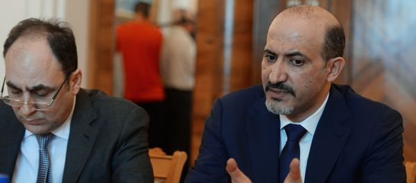 Ahmad al-Jarba, right, President of the National Coalition of Syrian Revolutionary and Opposition Forces, during a meeting between a Syrian opposition delegation and Russian Foreign Minister Sergei Lavrov in Moscow - Sputnik International