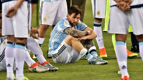Argentina's Lionel Messi waits to receive the second place medal during the Copa America Centenario awards ceremony in East Rutherford, New Jersey, United States, on June 26, 2016 Argentina's Lionel Messi waits to receive the second place medal during the Copa America Centenario awards ceremony in East Rutherford, New Jersey, United States, on June 26, 2016 - Sputnik International