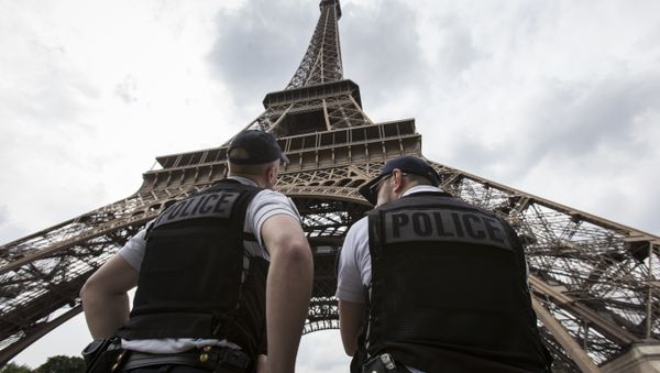 French riot police officers patrol under the Eiffel Tower, near the entrance of the soccer fan zone, prior to the Euro 2016 Group A soccer match between France and Romania, in Paris, Friday, June 10, 2016 French riot police officers patrol under the Eiffel Tower, near the entrance of the soccer fan zone, prior to the Euro 2016 Group A soccer match between France and Romania, in Paris, Friday, June 10, 2016 - Sputnik International