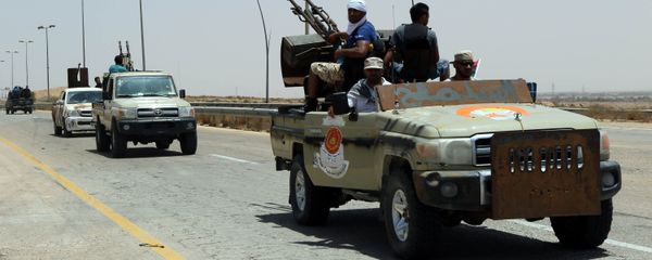 Forces loyal to Libya's UN-backed unity government patrol the entrance of Sirte as they advance to recapture the city from the Islamic State (IS) group jihadists on June 10, 2016 Forces loyal to Libya's UN-backed unity government patrol the entrance of Sirte as they advance to recapture the city from the Islamic State (IS) group jihadists on June 10, 2016 - Sputnik International
