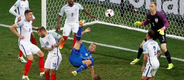 Football Soccer - England v Iceland - EURO 2016 - Round of 16 - Stade de Nice, Nice, France - 27/6/16Iceland's Ragnar Sigurdsson attempts an overhead kick Football Soccer - England v Iceland - EURO 2016 - Round of 16 - Stade de Nice, Nice, France - 27/6/16Iceland's Ragnar Sigurdsson attempts an overhead kick - Sputnik International