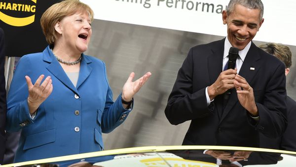 US President Barack Obama (R) and German Chancellor Angela Merkel share a laugh at the booth of Harting technology group as they tour the Hanover industrial Fair in Hanover, central Germany, on April 25, 2016 US President Barack Obama (R) and German Chancellor Angela Merkel share a laugh at the booth of Harting technology group as they tour the Hanover industrial Fair in Hanover, central Germany, on April 25, 2016 - Sputnik International
