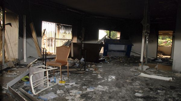 In this Sept. 12, 2012 file photo, glass, debris and overturned furniture are strewn inside a room in the gutted U.S. consulate in Benghazi, Libya, after an attack that killed four Americans, including Ambassador Chris Stevens - Sputnik International