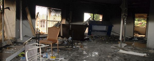 In this Sept. 12, 2012 file photo, glass, debris and overturned furniture are strewn inside a room in the gutted U.S. consulate in Benghazi, Libya, after an attack that killed four Americans, including Ambassador Chris Stevens - Sputnik International