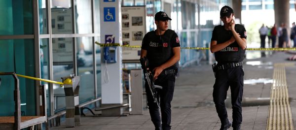 Police officers patrol at Turkey's largest airport, Istanbul Ataturk, following yesterday's blast June 29, 2016. - Sputnik International