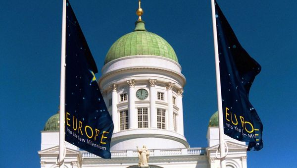 Blue flags carrying the slogan Europe -into the new millenium fly in the front of the Cathedral in Helsinki (file) - Sputnik International