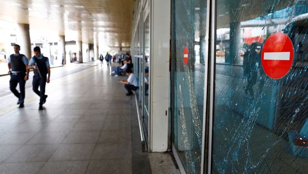 Police officers patrol at Turkey's largest airport, Istanbul Ataturk, following yesterday's blast, June 29, 2016. - Sputnik International