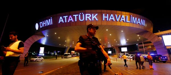 A riot police officer stands guard at the entrance of the Ataturk airport in Istanbul, Turkey, following a multiple suicide bombing, early June 29, 2016 A riot police officer stands guard at the entrance of the Ataturk airport in Istanbul, Turkey, following a multiple suicide bombing, early June 29, 2016 - Sputnik International