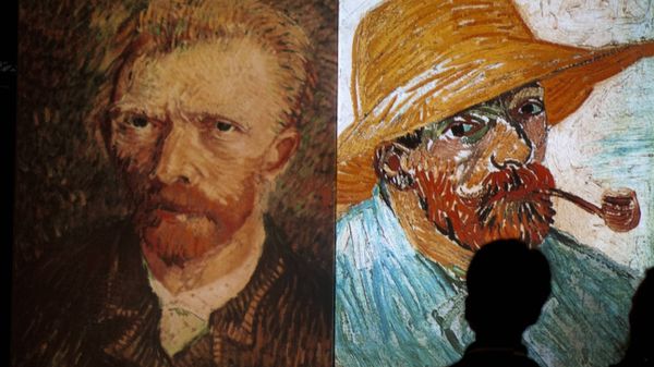 A visitor stands in front of giant screens featuring images of the work of Dutch painter Vincent van Gogh during a traveling multimedia art exhibition entitled Van Gogh alive on February 4, 2013 A visitor stands in front of giant screens featuring images of the work of Dutch painter Vincent van Gogh during a traveling multimedia art exhibition entitled Van Gogh alive on February 4, 2013 - Sputnik International