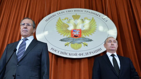 President Vladimir Putin, right, at a meeting of Russian ambassadors and permanent representatives in foreign countries held at the Foreign Ministry. Left: Russian Foreign Minister Sergei Lavrov President Vladimir Putin, right, at a meeting of Russian ambassadors and permanent representatives in foreign countries held at the Foreign Ministry. Left: Russian Foreign Minister Sergei Lavrov - Sputnik International