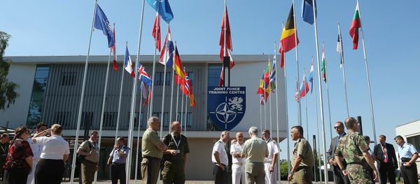 Participants of exercises in the field of computer systems are meeting in their break in front of the Joint Force Training Center in Bydgoszcz, Poland, Thursday, June 23, 2016. Participants of exercises in the field of computer systems are meeting in their break in front of the Joint Force Training Center in Bydgoszcz, Poland, Thursday, June 23, 2016. - Sputnik International