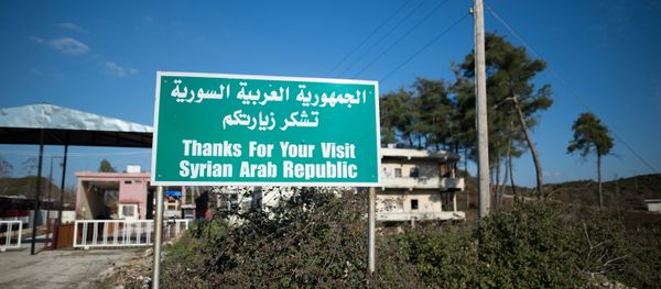 A sign by a closed checkpoint at the Syrian-Turkish border near the town of Kessab - Sputnik International