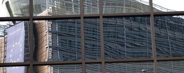 European Union headquarters is reflected in the windows of the EU Council building prior to an EU summit in Brussels on Tuesday, June 28, 2016. - Sputnik International