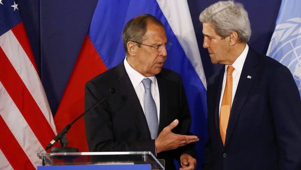 Russian Foreign Minister Sergei Lavrov (L) speaks to US Secretary of State John Kerry ahead a joint press conference in Vienna, Austria, on May 17, 2016 Russian Foreign Minister Sergei Lavrov (L) speaks to US Secretary of State John Kerry ahead a joint press conference in Vienna, Austria, on May 17, 2016 - Sputnik International