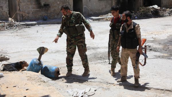 Syrian army soldiers check unexploded homemade rockets during a patrol in Aleppo (File) Syrian army soldiers check unexploded homemade rockets during a patrol in Aleppo (File) - Sputnik International