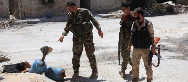 Syrian army soldiers check unexploded homemade rockets during a patrol in Aleppo (File) Syrian army soldiers check unexploded homemade rockets during a patrol in Aleppo (File) - Sputnik International