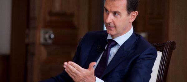 In this photo released on July 1, 2016, by the Syrian official news agency SANA, Syrian President Bashar Assad speaks during an interview with Australia's SBS news channel, in Damascus, Syria - Sputnik International