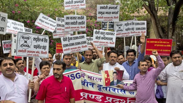 Activists of Swadeshi Jagaran Manch, a Hindu right wing organization promoting indigenous products, shout slogans during a protest near the Chinese embassy in New Delhi, India, Tuesday, June 28, 2016 Activists of Swadeshi Jagaran Manch, a Hindu right wing organization promoting indigenous products, shout slogans during a protest near the Chinese embassy in New Delhi, India, Tuesday, June 28, 2016 - Sputnik International