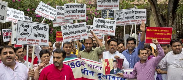 Activists of Swadeshi Jagaran Manch, a Hindu right wing organization promoting indigenous products, shout slogans during a protest near the Chinese embassy in New Delhi, India, Tuesday, June 28, 2016 Activists of Swadeshi Jagaran Manch, a Hindu right wing organization promoting indigenous products, shout slogans during a protest near the Chinese embassy in New Delhi, India, Tuesday, June 28, 2016 - Sputnik International