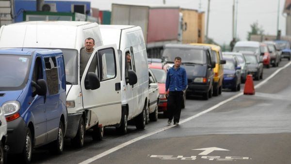 Cars queu at the Shegyni checkpoint on the border with Ukraine and Poland some 100kms from the western Ukrainian city of Lviv (File) Cars queu at the Shegyni checkpoint on the border with Ukraine and Poland some 100kms from the western Ukrainian city of Lviv (File) - Sputnik International