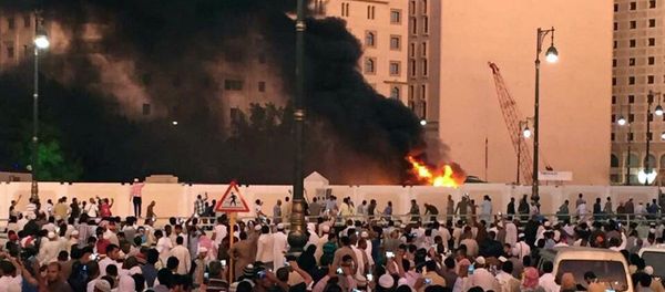 Muslim worshippers gather after a suicide bomber detonated a device near the security headquarters of the Prophet's Mosque in Medina, Saudi Arabia, July 4, 2016 Muslim worshippers gather after a suicide bomber detonated a device near the security headquarters of the Prophet's Mosque in Medina, Saudi Arabia, July 4, 2016 - Sputnik International