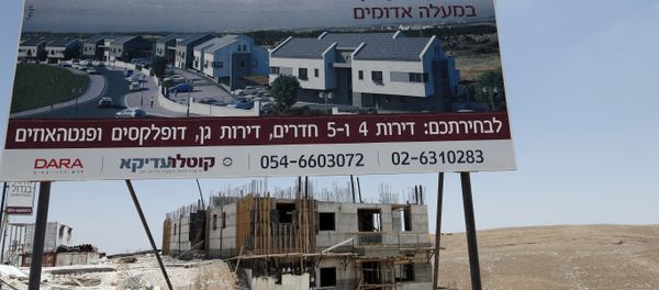 A picture taken on July 4, 2016, shows buildings under construction in the Israeli settlement of Maale Adumim, east of Jerusalem in the occupied West Bank. - Sputnik International