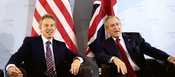 US President George W. Bush (R) and Britain’s Prime Minister Tony Blair pose for photographers prior a bilateral meeting 07 June 2007 on the sidelines of the G8 Summit in Heiligendamm, northeastern Germany. - Sputnik International