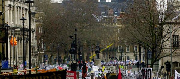 Opponents of the US-led war on Iraq demonstrate en masse in central London 15 February 2003 as tens of thousands of anti-war demonstrators around the world took the streets. Opponents of the US-led war on Iraq demonstrate en masse in central London 15 February 2003 as tens of thousands of anti-war demonstrators around the world took the streets. - Sputnik International