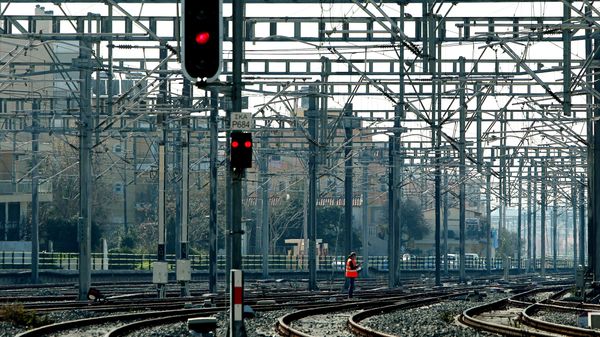 A construction worker walks amongst rail tracks during a Greek railway strike (File) A construction worker walks amongst rail tracks during a Greek railway strike (File) - Sputnik International