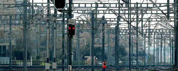A construction worker walks amongst rail tracks during a Greek railway strike (File) A construction worker walks amongst rail tracks during a Greek railway strike (File) - Sputnik International