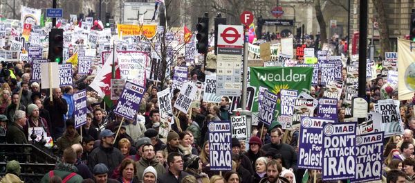 Demonstrators at the rally in London, 15 February 2003, as worldwide protests brought tens of thousands into the streets to show their opposition to a possible US-led war against Iraq. Demonstrators at the rally in London, 15 February 2003, as worldwide protests brought tens of thousands into the streets to show their opposition to a possible US-led war against Iraq. - Sputnik International
