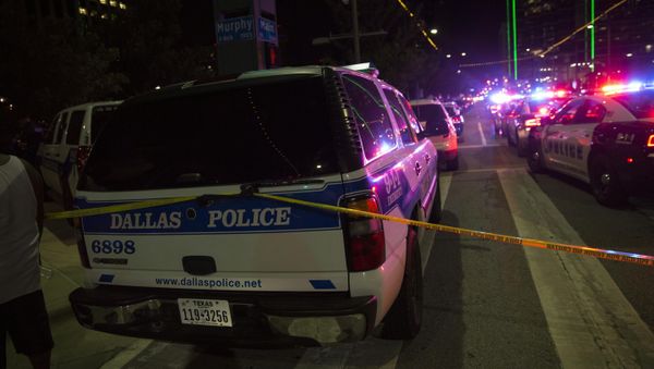 Police cars sit on Main Street in Dallas following the sniper shooting during a protest on July 7, 2016. - Sputnik International