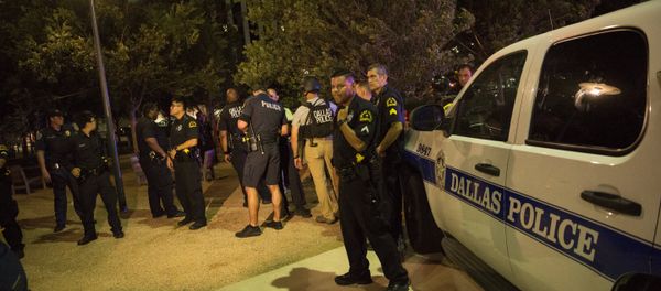 Police cars sit on Main Street in Dallas following the sniper shooting during a protest on July 7, 2016. - Sputnik International