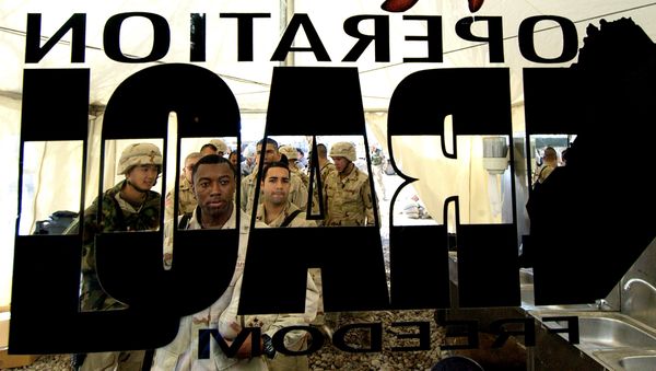 US soldiers from the 4th Infantry Division stand in a queue for their Christmas lunch out side a glass door where a logo of US army reading Operation Iraqi Freedom is pasted at a US base in Tikrit, 180 Kilometers (110 miles) north of Iraqi capital Baghdad, 25 December 2003 US soldiers from the 4th Infantry Division stand in a queue for their Christmas lunch out side a glass door where a logo of US army reading Operation Iraqi Freedom is pasted at a US base in Tikrit, 180 Kilometers (110 miles) north of Iraqi capital Baghdad, 25 December 2003 - Sputnik International
