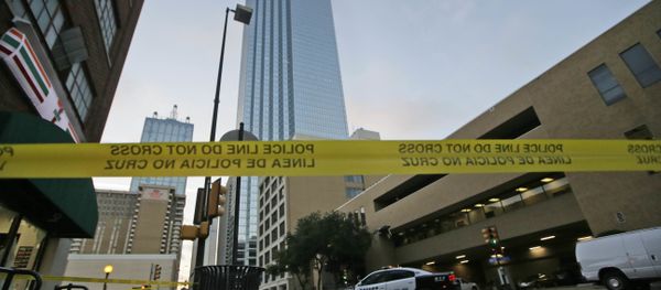 Police tape marks off the area where a shooting took place in downtown Dallas, Friday, July 8, 2016. Police tape marks off the area where a shooting took place in downtown Dallas, Friday, July 8, 2016. - Sputnik International