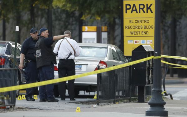 Crime scene investigators survey the area after a shooting in downtown Dallas, Friday, July 8, 2016. - Sputnik International