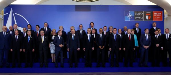 NATO Summit leaders gather for a family photo before a working dinner at the Presidential Palace in Warsaw, Poland July 8, 2016. NATO Summit leaders gather for a family photo before a working dinner at the Presidential Palace in Warsaw, Poland July 8, 2016. - Sputnik International