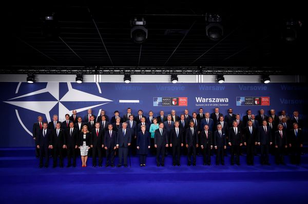 NATO heads of state and other leaders participate in a family photo at the NATO Summit in Warsaw, Poland July 8, 2016. - Sputnik International