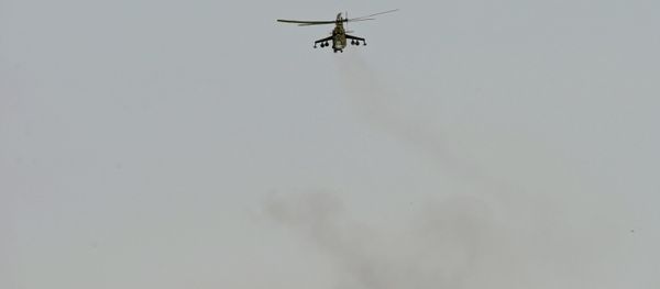 A Mi 24 helicopter of the Syrian army in the vicinity of Palmyra, Syria. A Mi 24 helicopter of the Syrian army in the vicinity of Palmyra, Syria. - Sputnik International